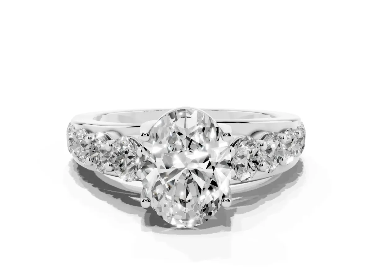 Oval Cut Diamond Engagement Ring with Pavé Band and Four-Prong Setting Platinum