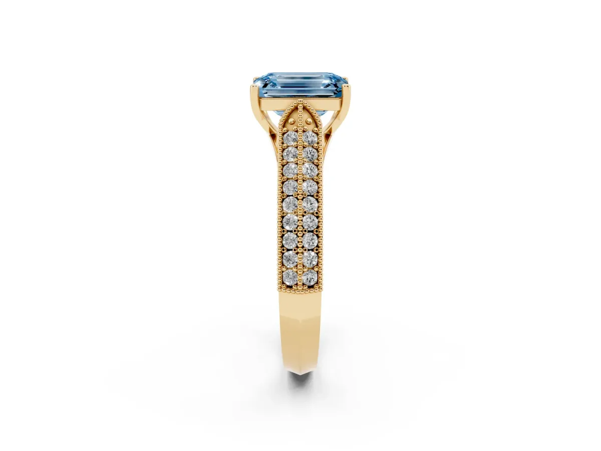 Fancy Blue Emerald Cut Cut Pave Split Shank Engagement Ring with Four-Prong Setting Yellow gold