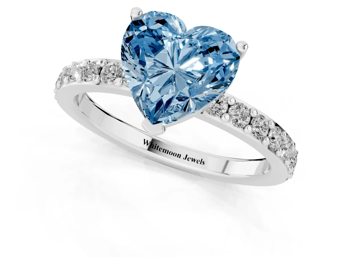 Fancy Blue Heart Cut Cut Diamond Solitaire with Pave Band and Four-Prong Setting Silver