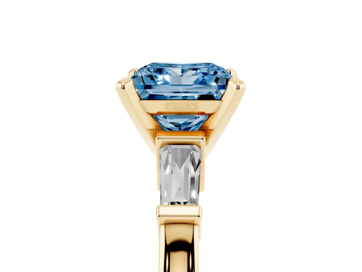 Fancy Blue Princess Cut Cut Diamond Solitaire Ring with Tapered Baguette Accents and Four-Prong Setting Yellow gold