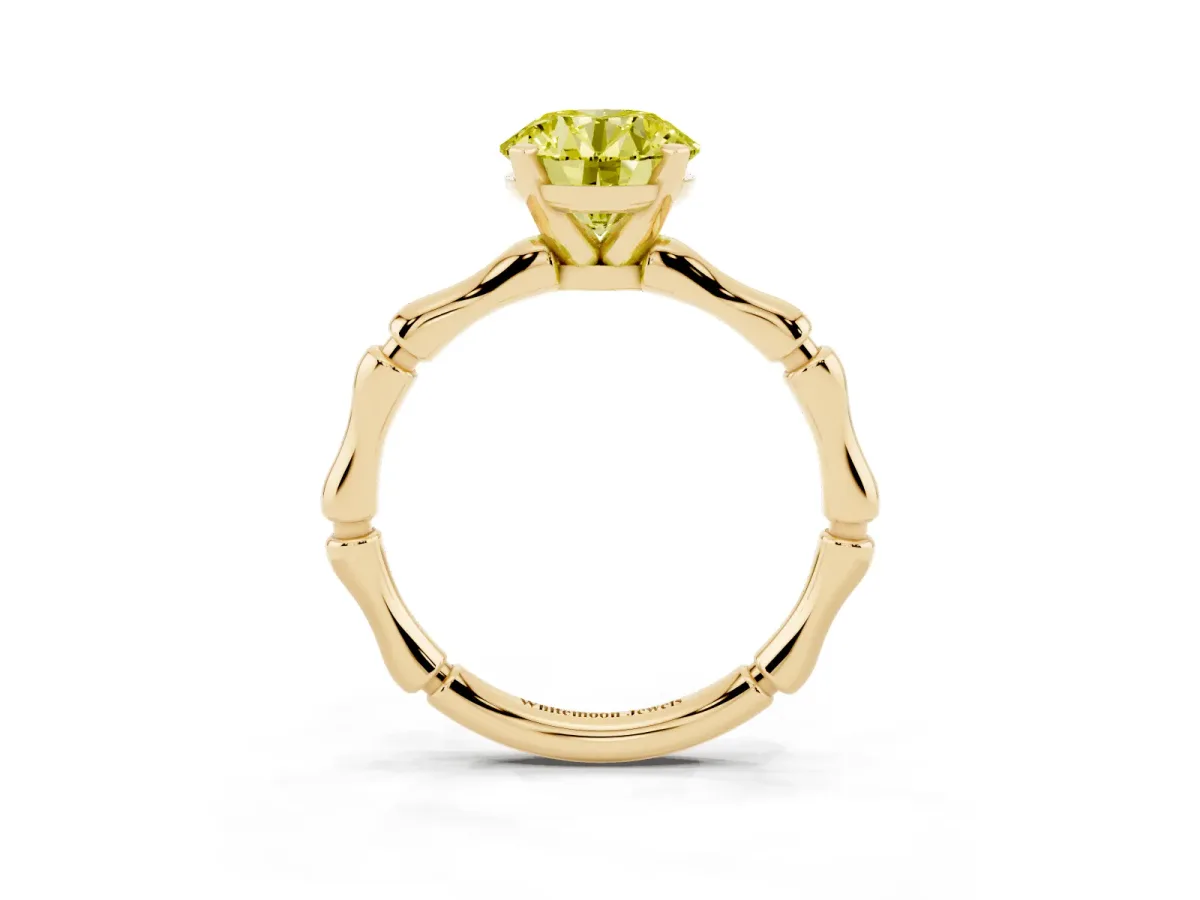 Fancy Yellow Round Cut Solitaire Diamond Ring with Bamboo Band and Four-Prong Setting Yellow gold