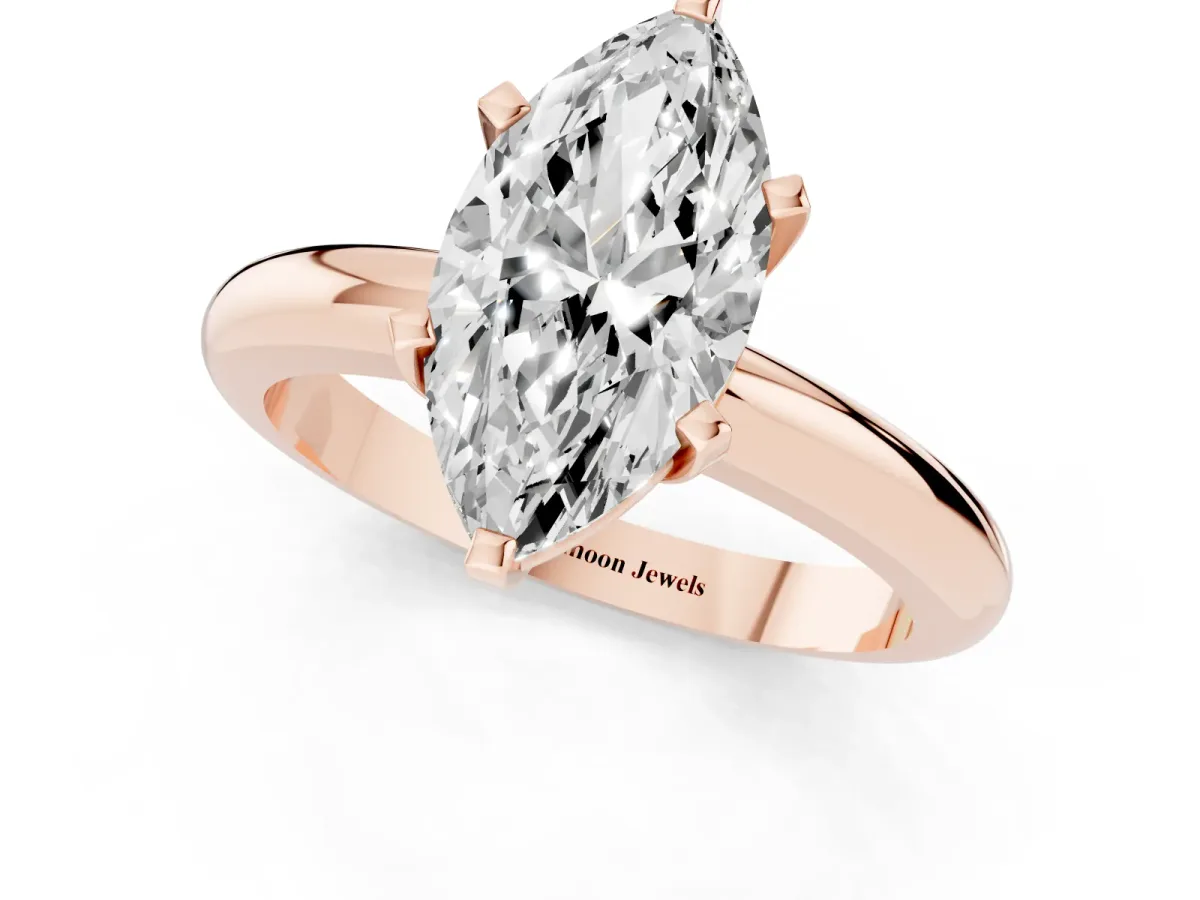 Marquise Cut Diamond Solitaire Engagement Ring with Round Band and Four-Prong Setting Rose gold