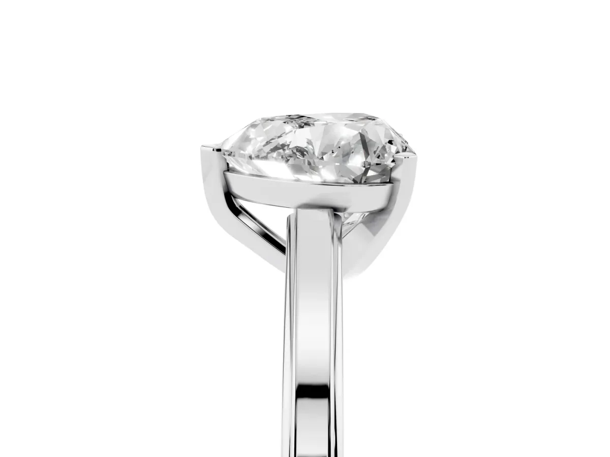 Heart Cut Solitaire Diamond Ring with Four-Prong Setting and Classic Band Silver