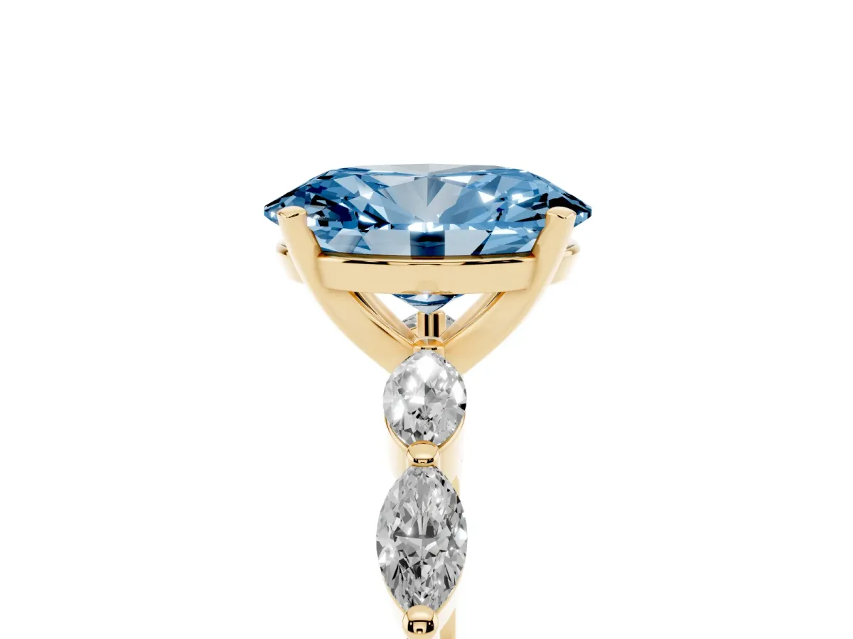 Fancy Blue Oval Cut Diamond Ring with Marquise Side Stones and Prong Setting Yellow gold