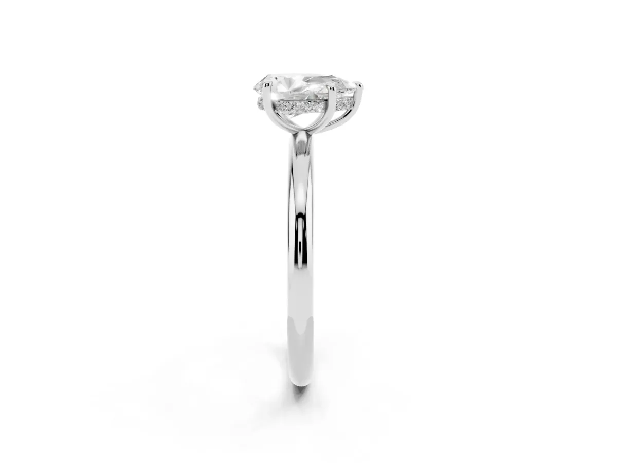 Pear Cut Diamond Solitaire Ring with Thin Band and Four-Prong Setting Silver