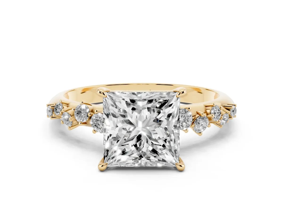 Princess Cut Diamond Cluster Side Stone Solitaire Ring with Prong Setting Yellow gold
