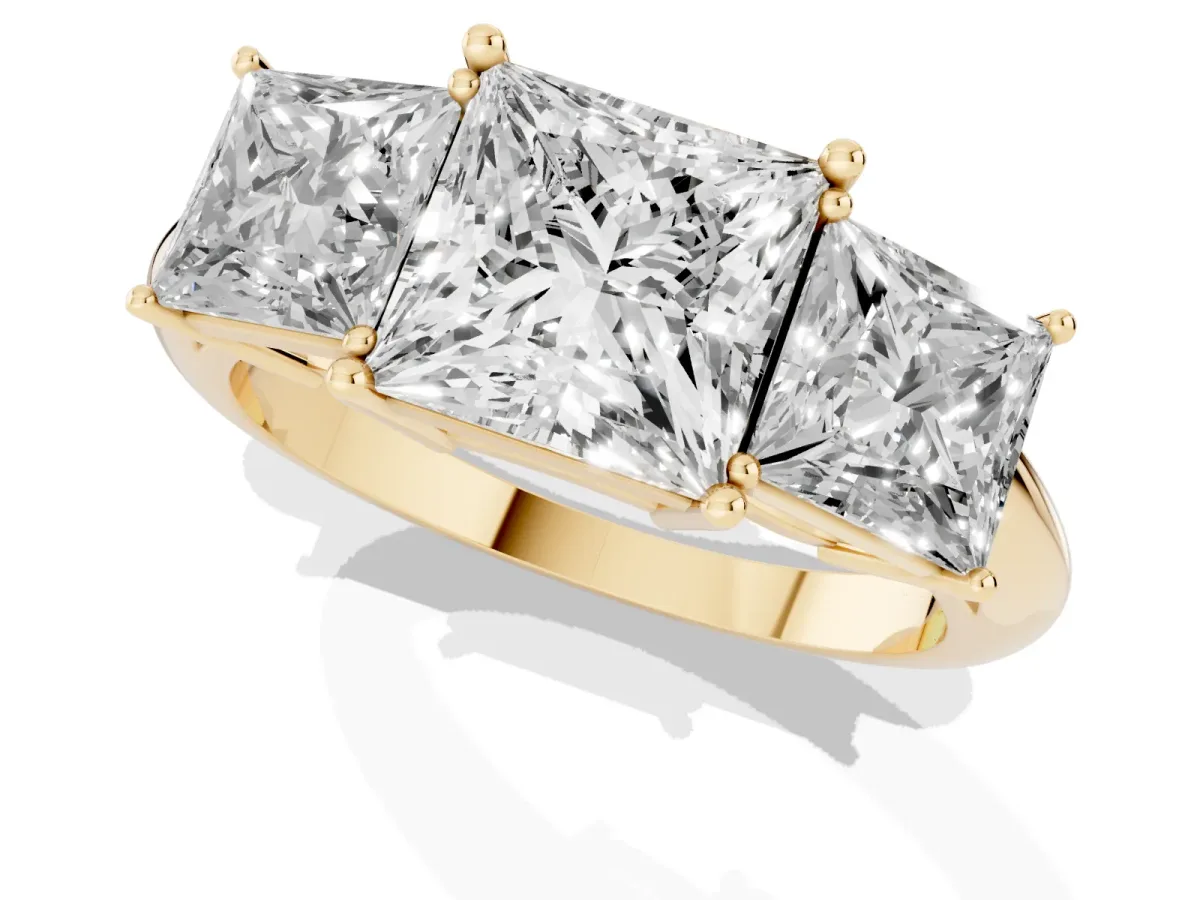 Three-Stone Princess Cut Cut Diamond Engagement Ring with Prong Setting on a White Gold Band Yellow gold