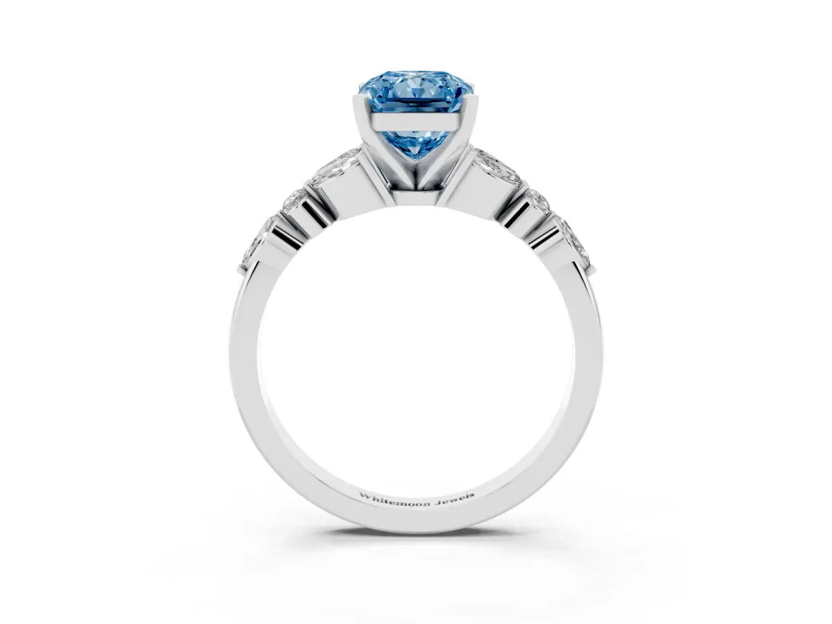 Fancy Blue Radiant Cut Diamond Solitaire Ring with Side Stones and Four-Prong Setting Platinum