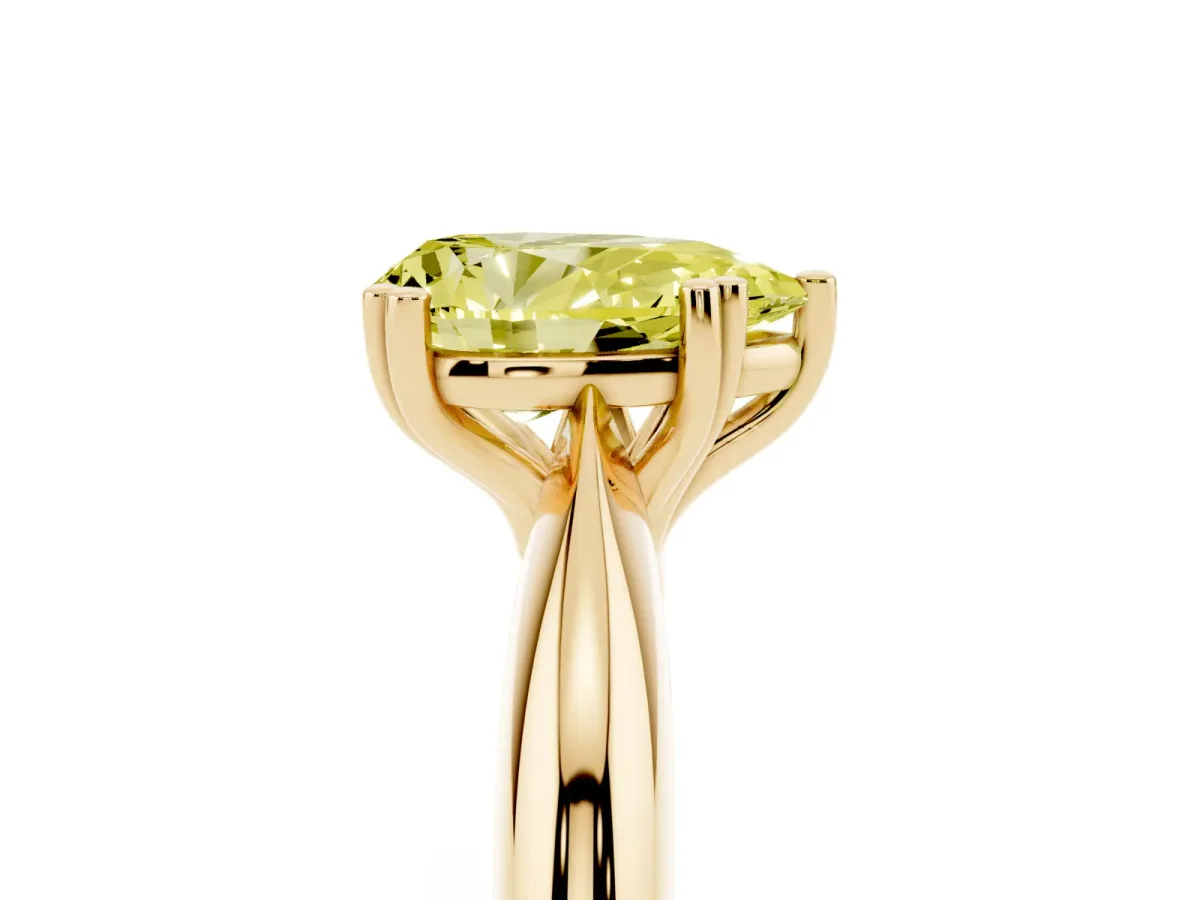Fancy Yellow Pear Cut Cut Solitaire Engagement Ring with Tapered Band and Four-Prong Setting Yellow gold