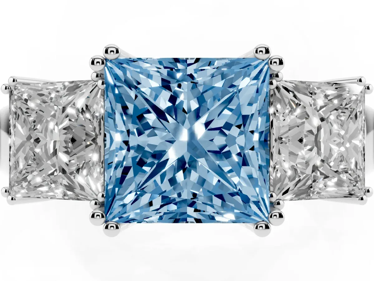 Fancy Blue Three-Stone Princess Cut Cut Diamond Ring with Channel Set Band and Four-Prong Setting Platinum