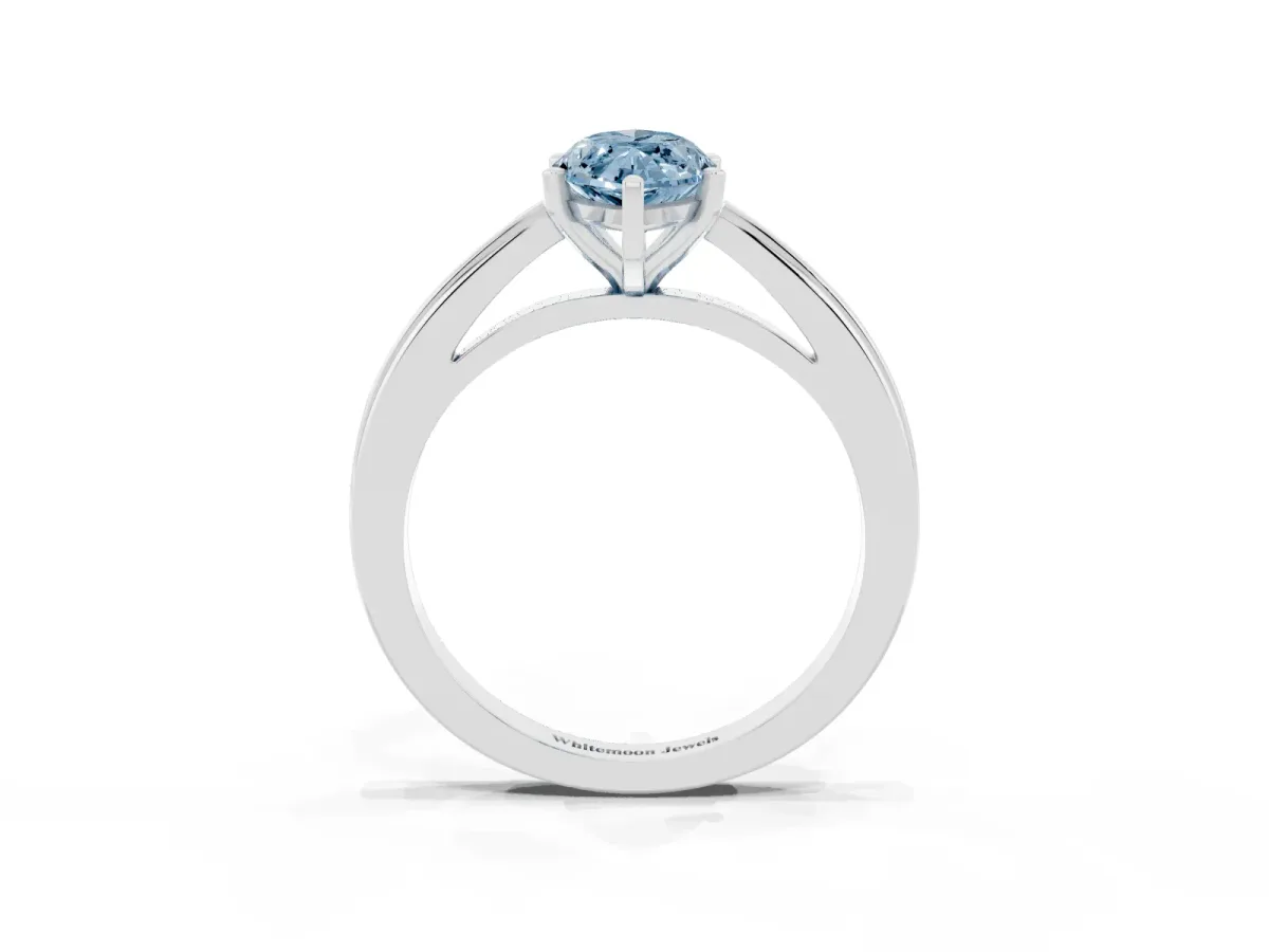 Fancy Blue Marquise Cut Solitaire Diamond Ring with Four-Prong Setting and Classic Band Platinum