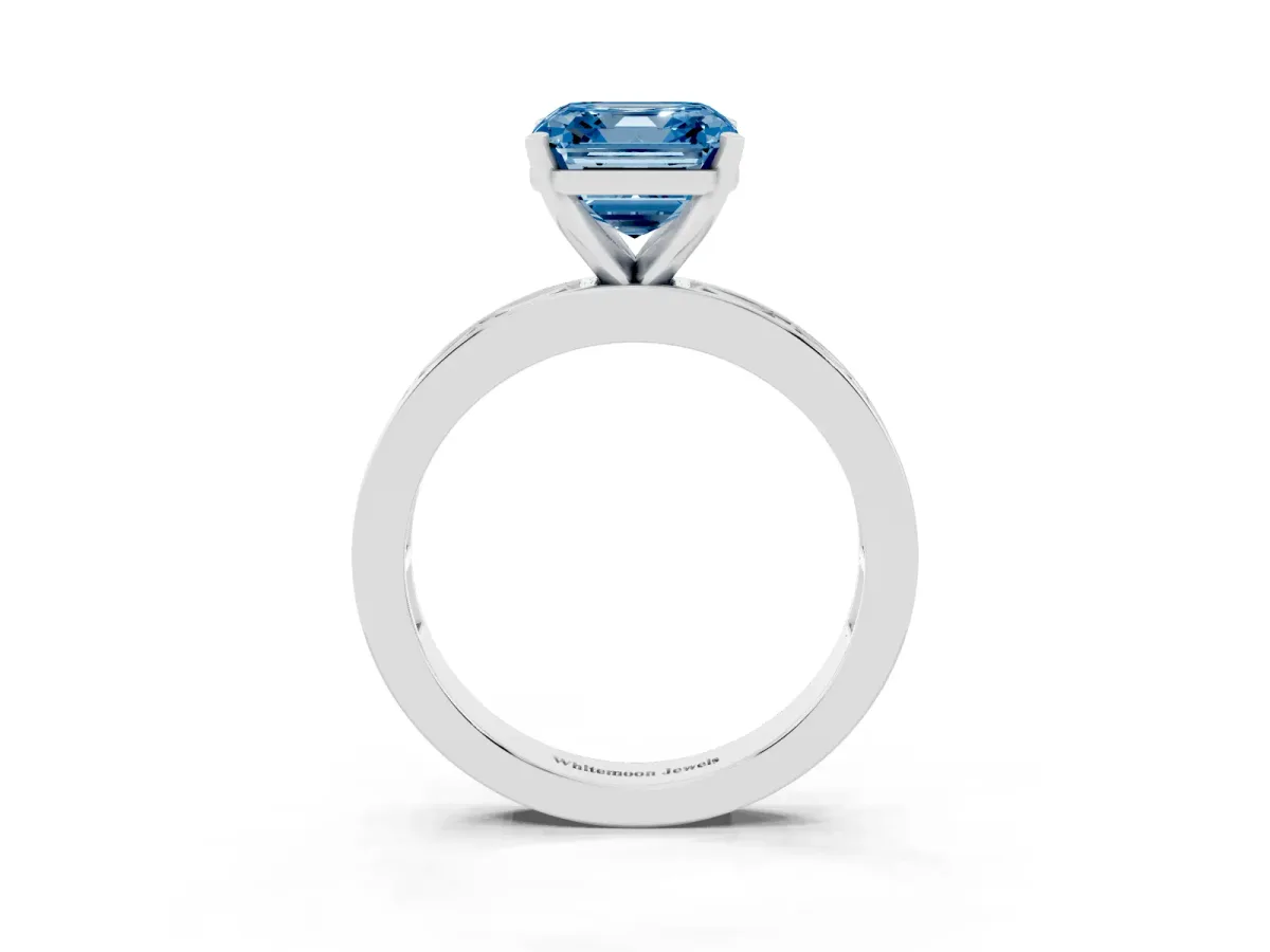 Fancy Blue Asscher Cut Solitaire Diamond Ring with Channel-Set Baguette Band and Four-Prong Setting Silver
