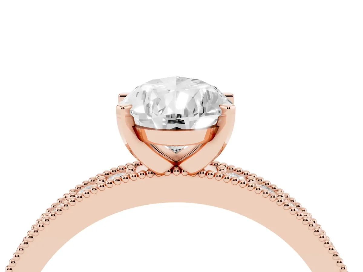 Pear Cut Diamond Milgrain Pavé Engagement Ring with Four-Prong Setting Rose gold