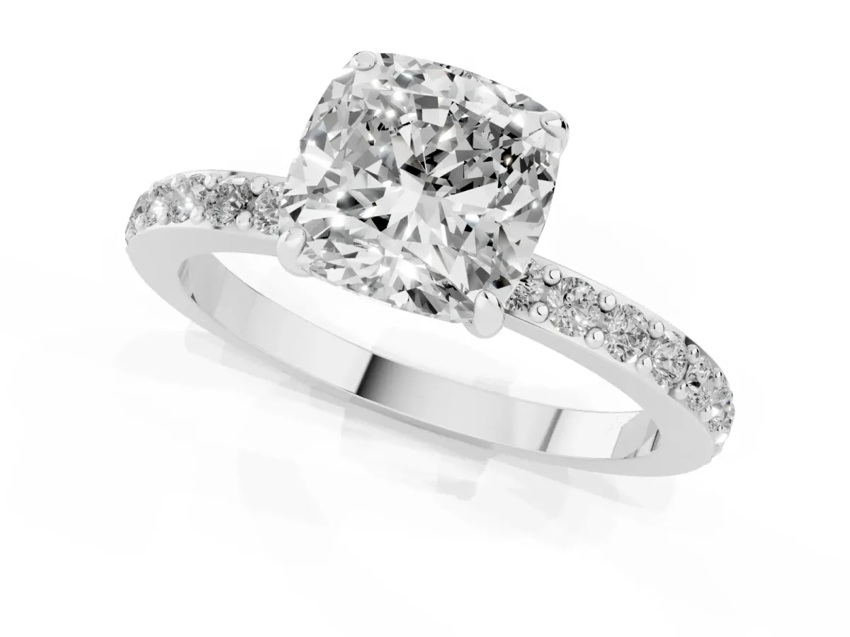 Cushion Cut Diamond Solitaire Engagement Ring with Pavé Band and Four-Prong Setting Silver