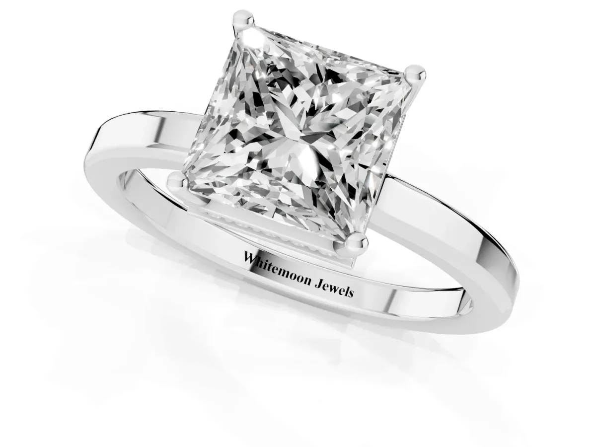 Princess Cut Cut Solitaire Engagement Ring with Four-Prong Setting on a Classic Band Silver
