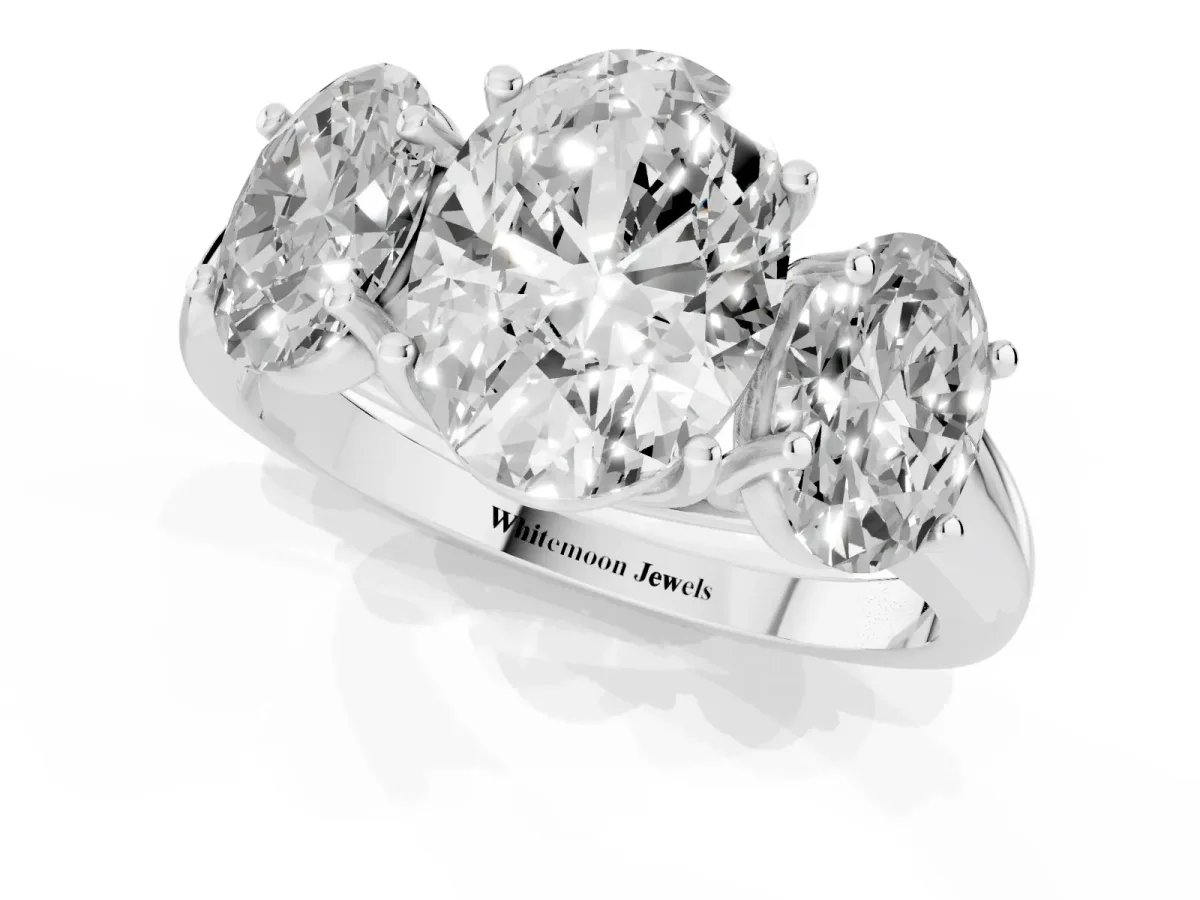 Three-Stone Oval Cut Diamond Engagement Ring with Prong Setting White gold