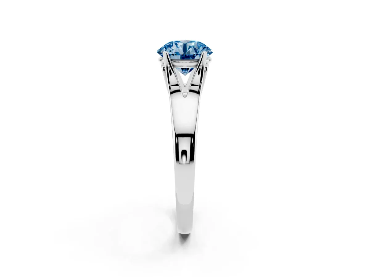 Fancy Blue Round Cut Solitaire Diamond Ring with Cathedral Band and Four-Prong Setting Silver