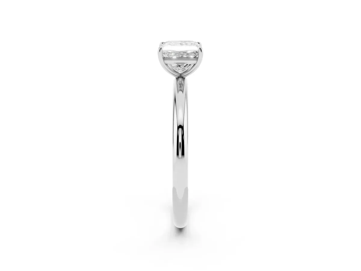 Princess Cut Solitaire Diamond Ring with Four-Prong Setting on a Plain Band Platinum