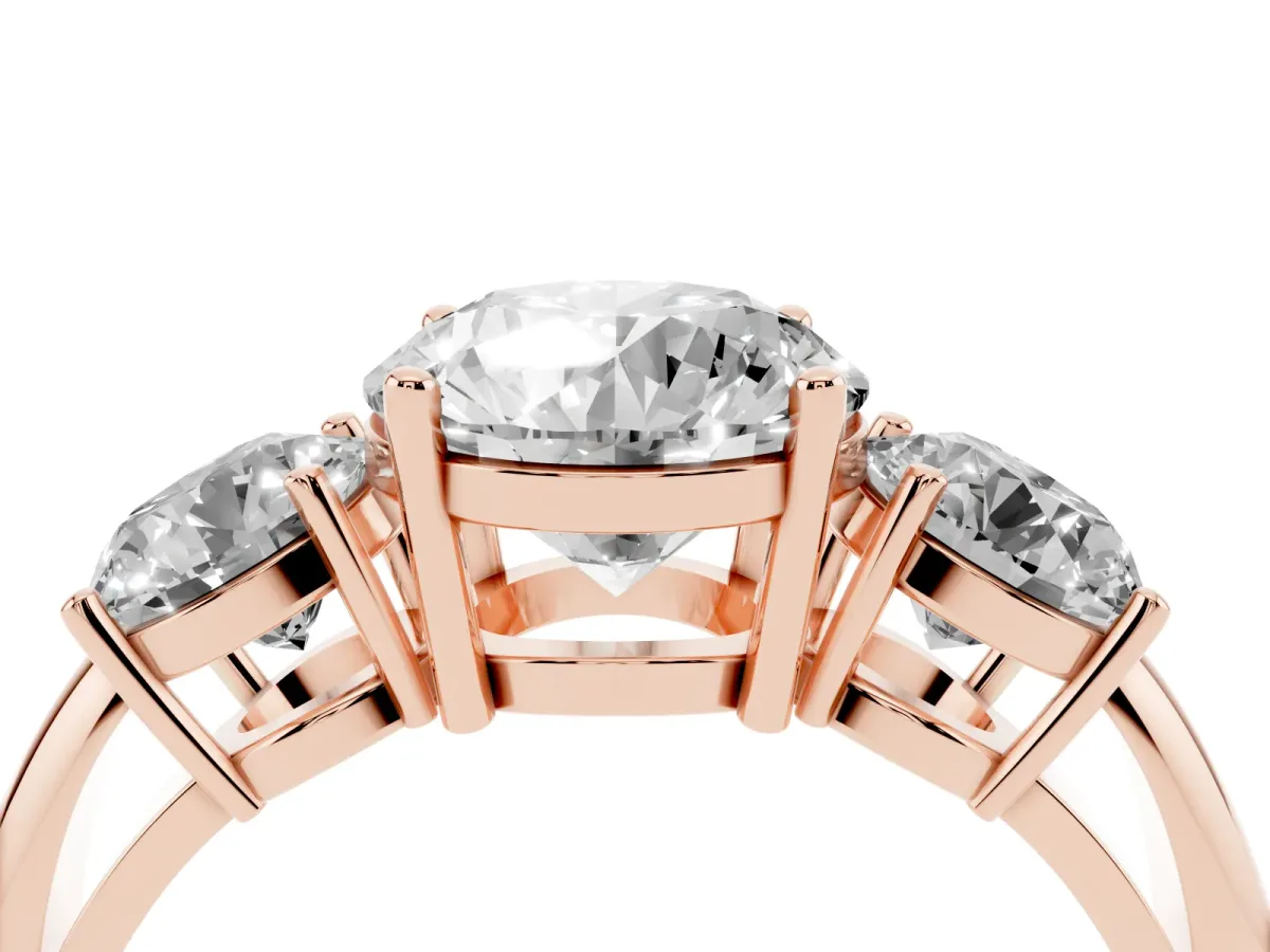 Three-Stone Round Cut Cut Diamond Engagement Ring with Prong Setting on a White Gold Band Rose gold