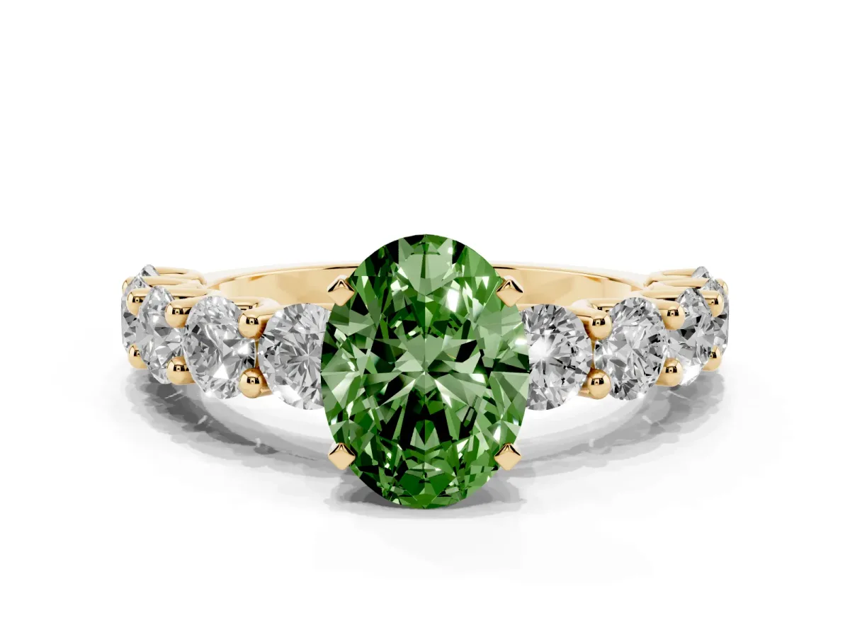 Fancy Green Oval Cut Diamond Prong Setting with Side Stones on a Pave Band Yellow gold