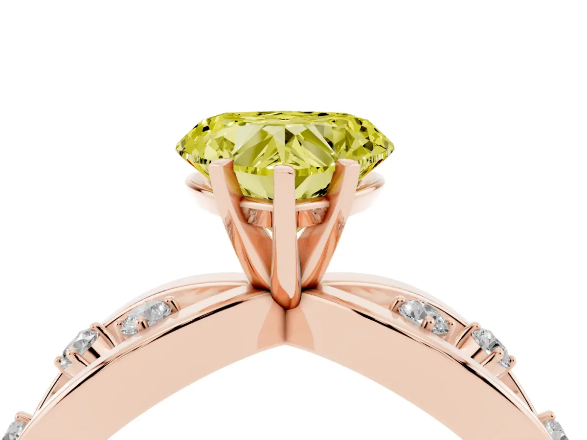 Fancy Yellow Heart Cut Cut Solitaire Diamond with Side Stones on Criss-Cross Band and Four-Prong Setting Rose gold
