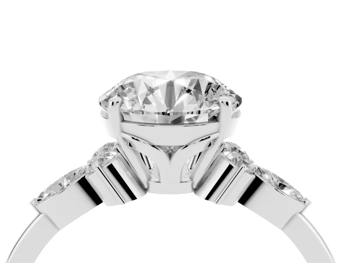 Round Cut Brilliant Diamond Solitaire Ring with Pear Side Stones and Four-Prong Setting Silver