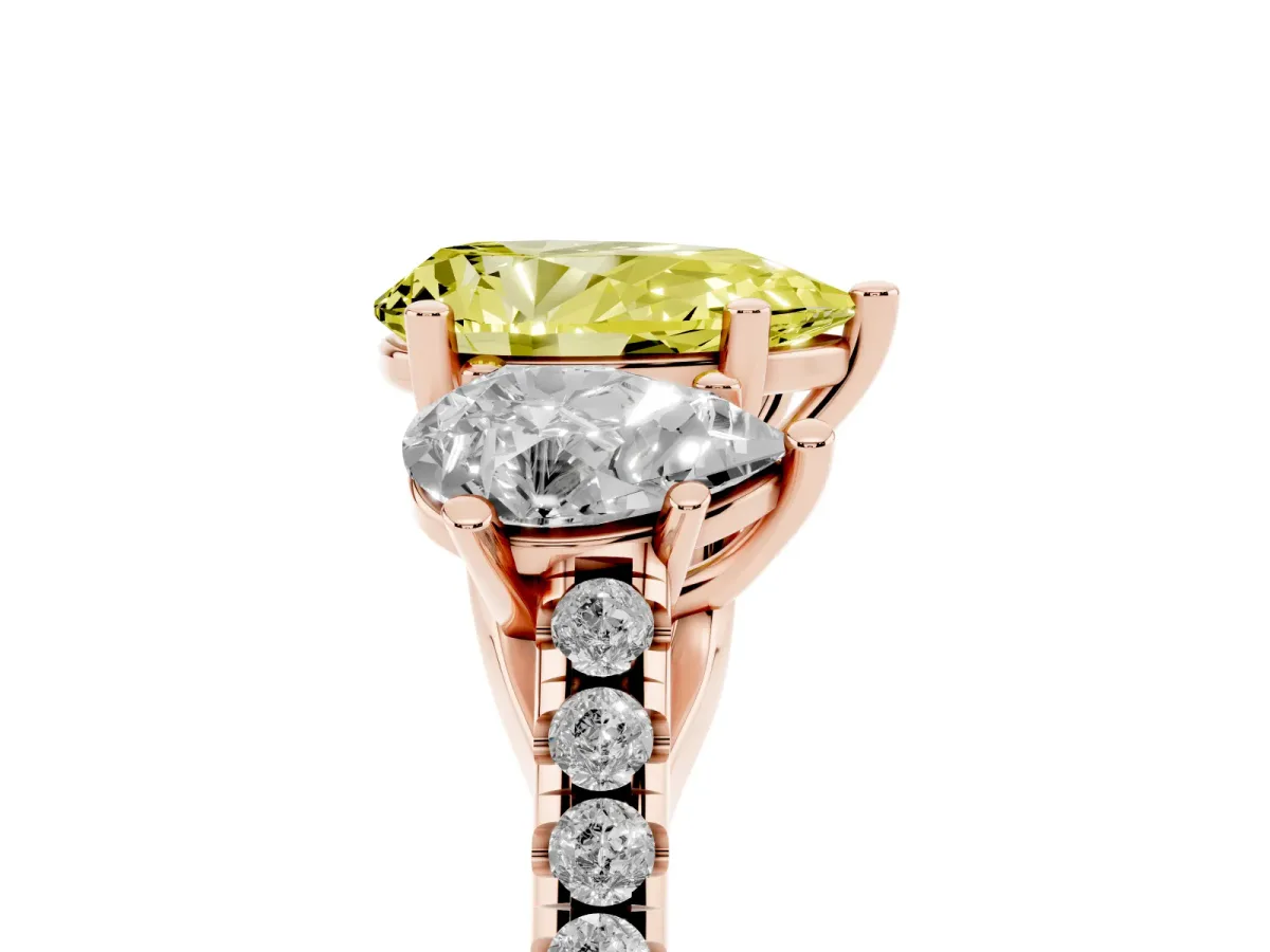 Fancy Yellow Three-Stone Pear Cut Diamond Ring with Round Pavé Band and Prong Setting Rose gold