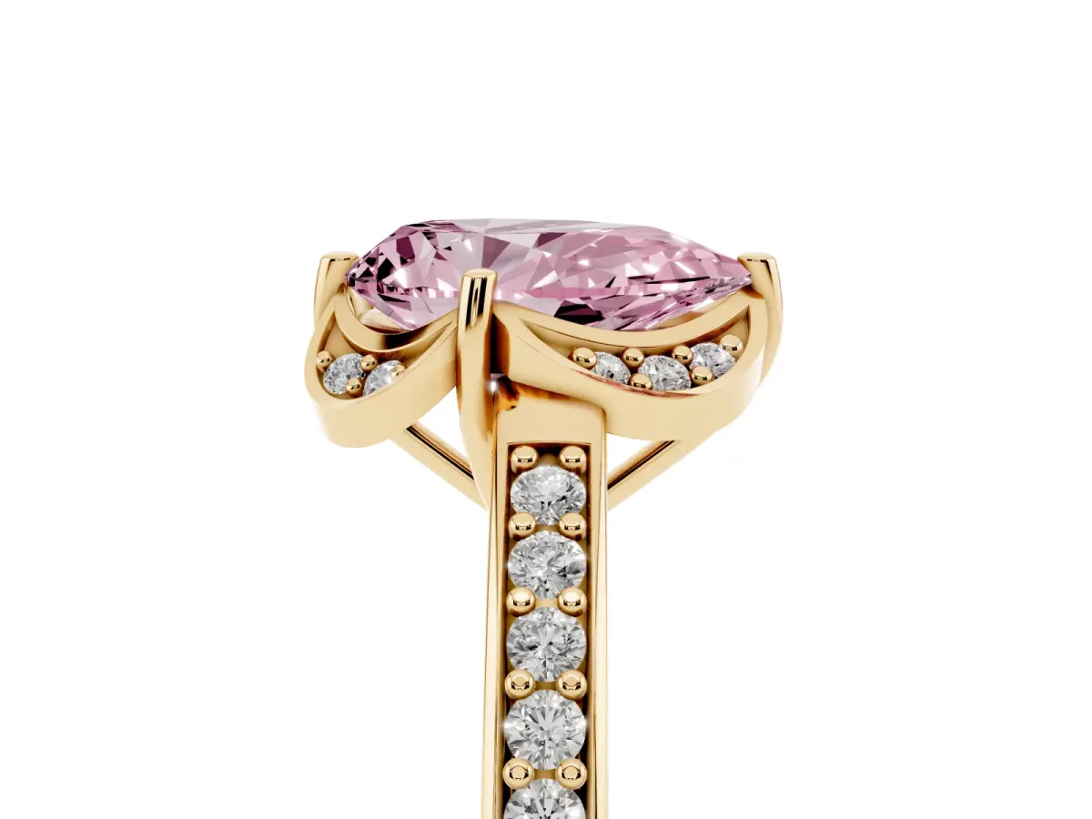 Fancy Pink Pear Cut Cut Halo Diamond Ring with Channel Set Band and Four-Prong Setting Yellow gold