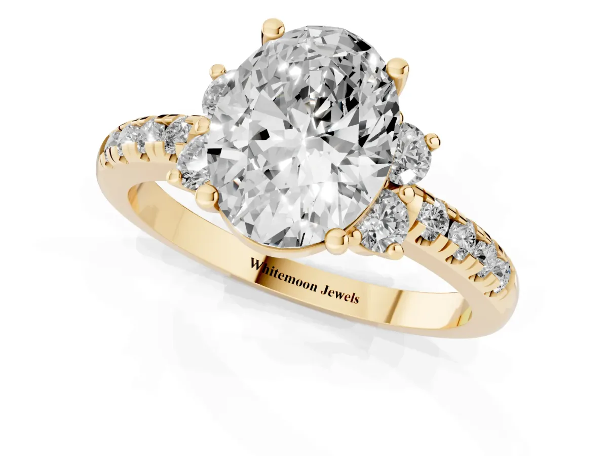 Oval Cut Diamond Three-Stone Pave Band with Four-Prong Setting Yellow gold