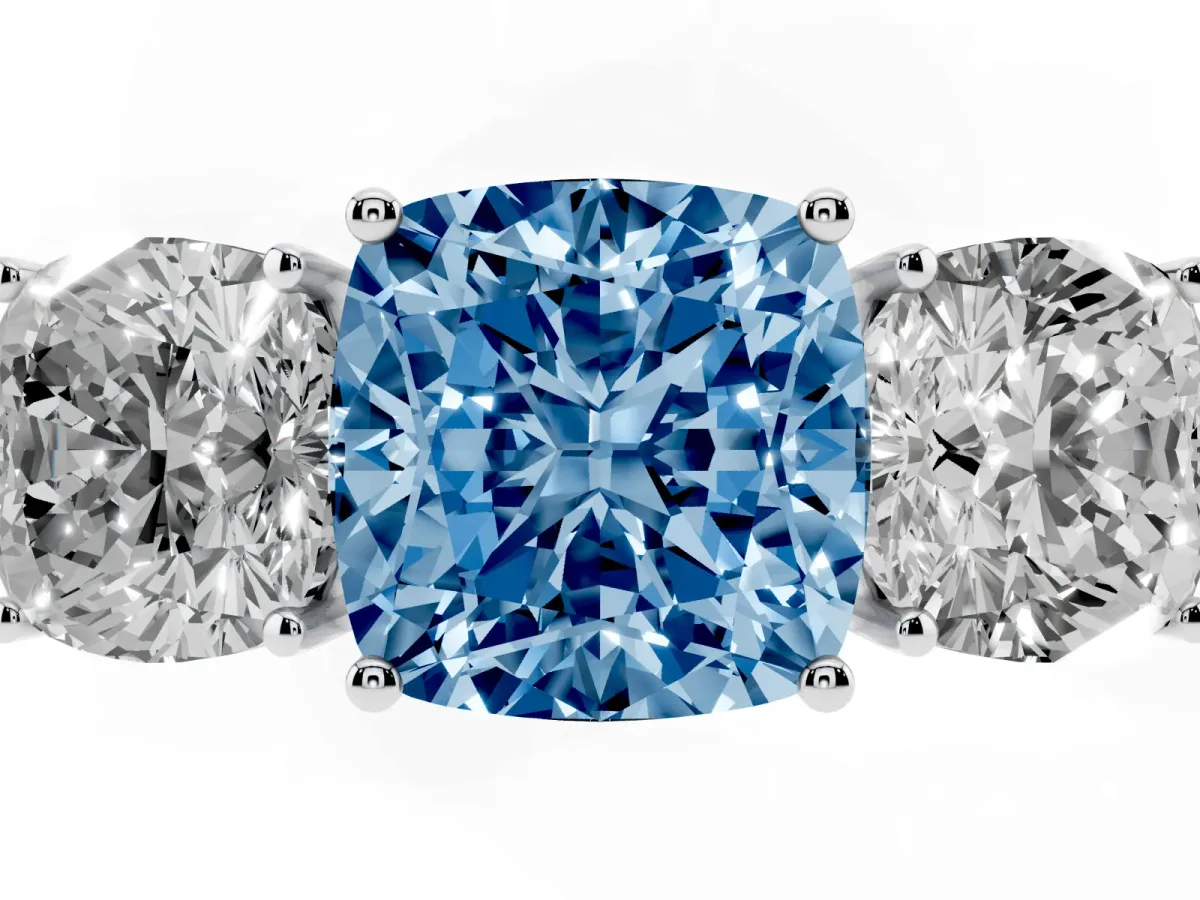 Fancy Blue Cushion Cut Diamond Three-Stone Ring with Prong Setting and Textured Band Platinum