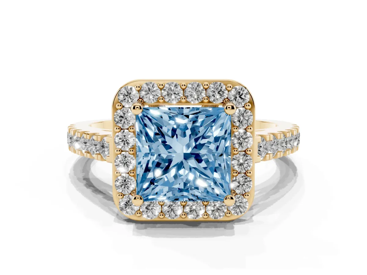 Fancy Blue Princess Cut Diamond Halo Ring with Round Pavé Split Shank and Prong Setting Yellow gold
