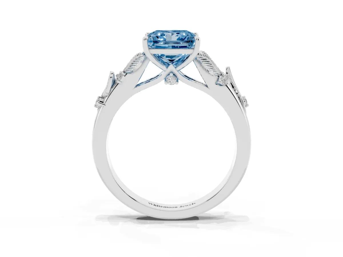 Fancy Blue Princess Cut Diamond Solitaire Ring with Leaf Motif Band and Four-Prong Setting Silver
