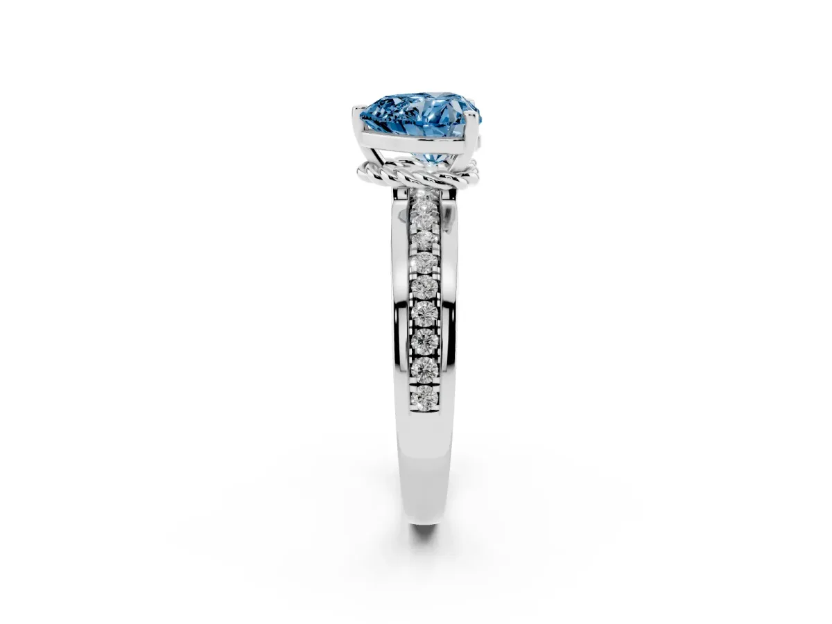 Fancy Blue Heart Cut Solitaire Diamond Ring with Channel Set Band and Six-Prong Setting Platinum