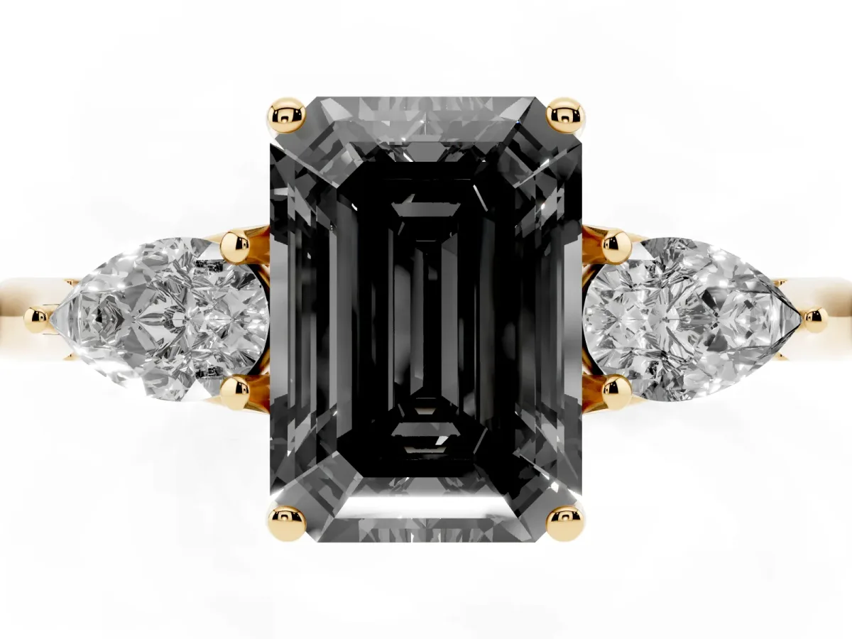 Fancy Black Three-Stone Emerald Cut Brilliant Diamond Solitaire Ring with Tapered Band and Four-Prong Setting Yellow gold