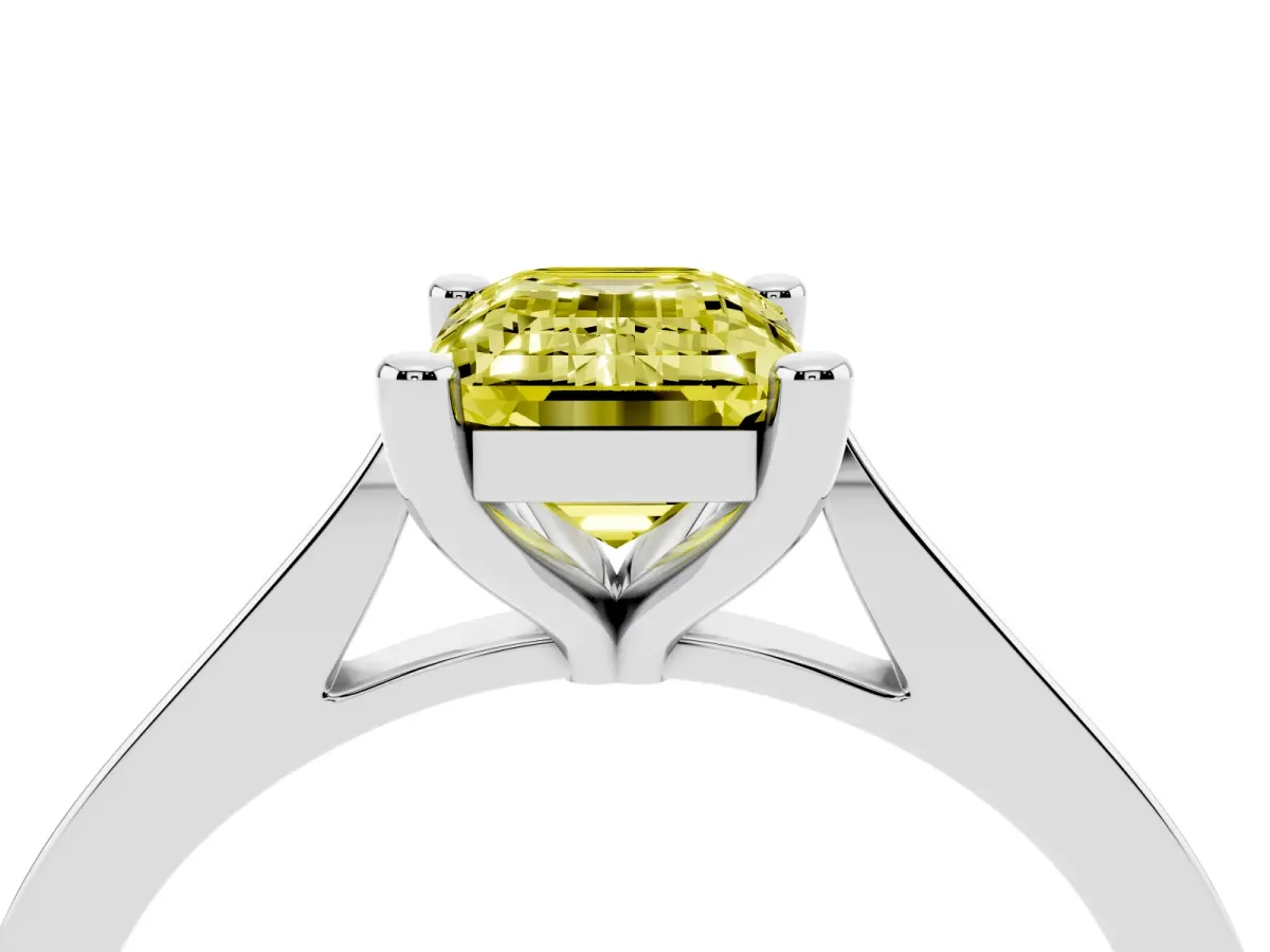 Fancy Yellow Emerald Cut Solitaire Diamond Ring with Four-Prong Setting and Tapered Band Silver
