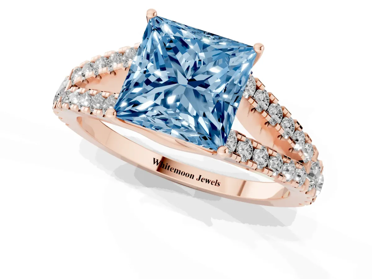 Fancy Blue Princess Cut Diamond Split Shank Pavé Engagement Ring with Four-Prong Setting Rose gold