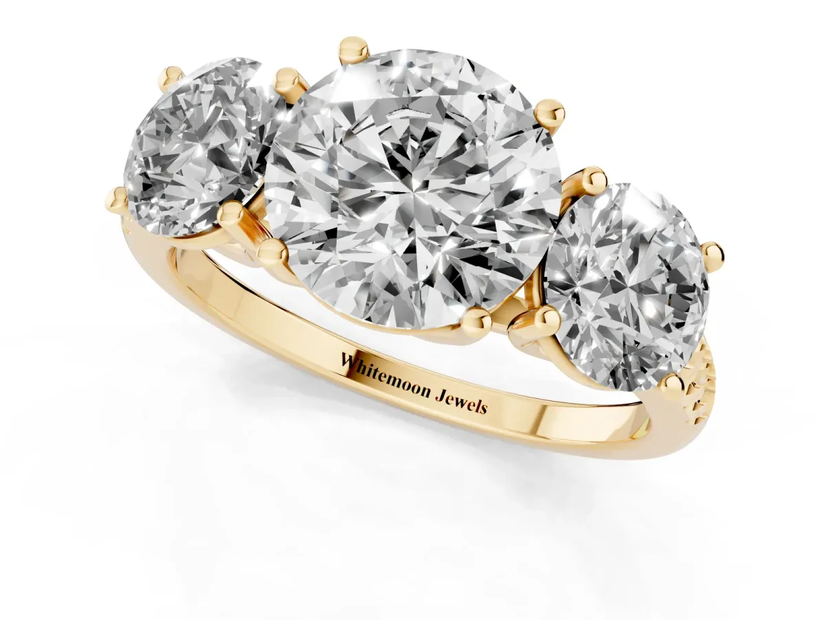 Three-Stone Round Cut Diamond Ring with Round Pavé Band and Prong Setting Yellow gold
