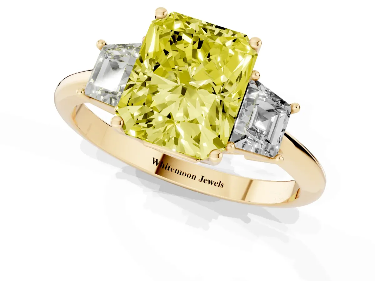 Fancy Yellow Radiant Cut Diamond Three-Stone Ring with Trapezoid Side Stones and Prong Setting Yellow gold