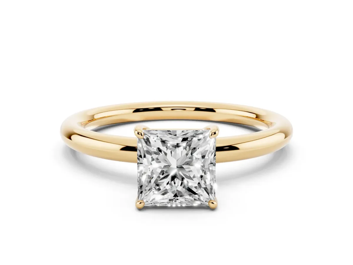 Princess Cut Solitaire Diamond Ring with Four-Prong Setting on a Plain Band Yellow gold