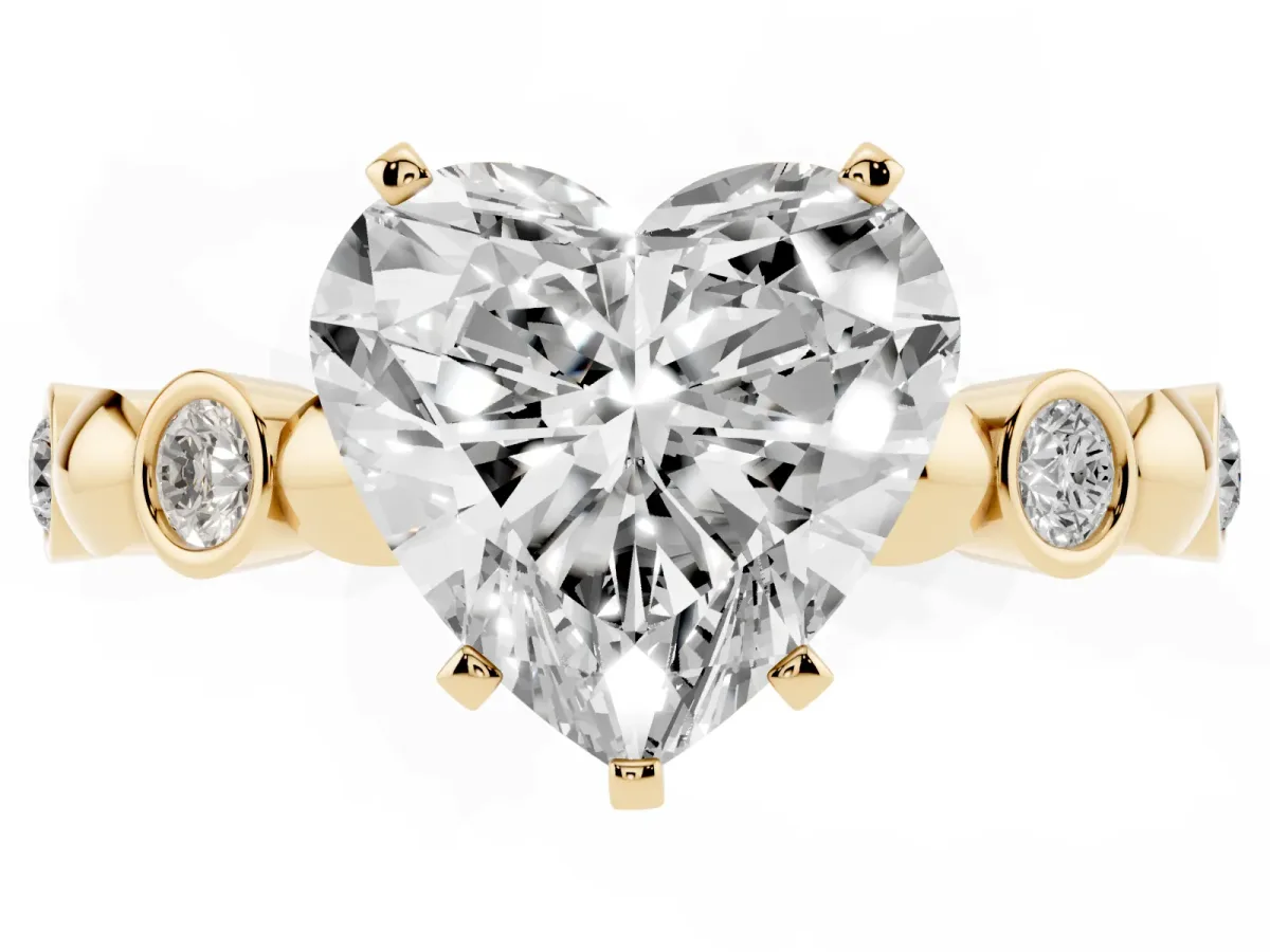 Heart Cut Solitaire Bezel-Set Diamond Ring with Beaded Band and Four-Prong Setting Yellow gold