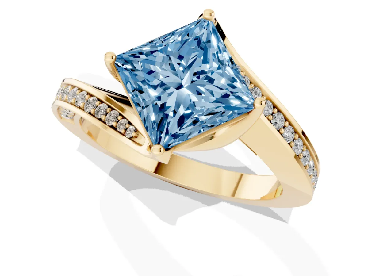Fancy Blue Princess Cut Solitaire Diamond Twist Band with Pavé Setting and Four-Prong Setting Yellow gold
