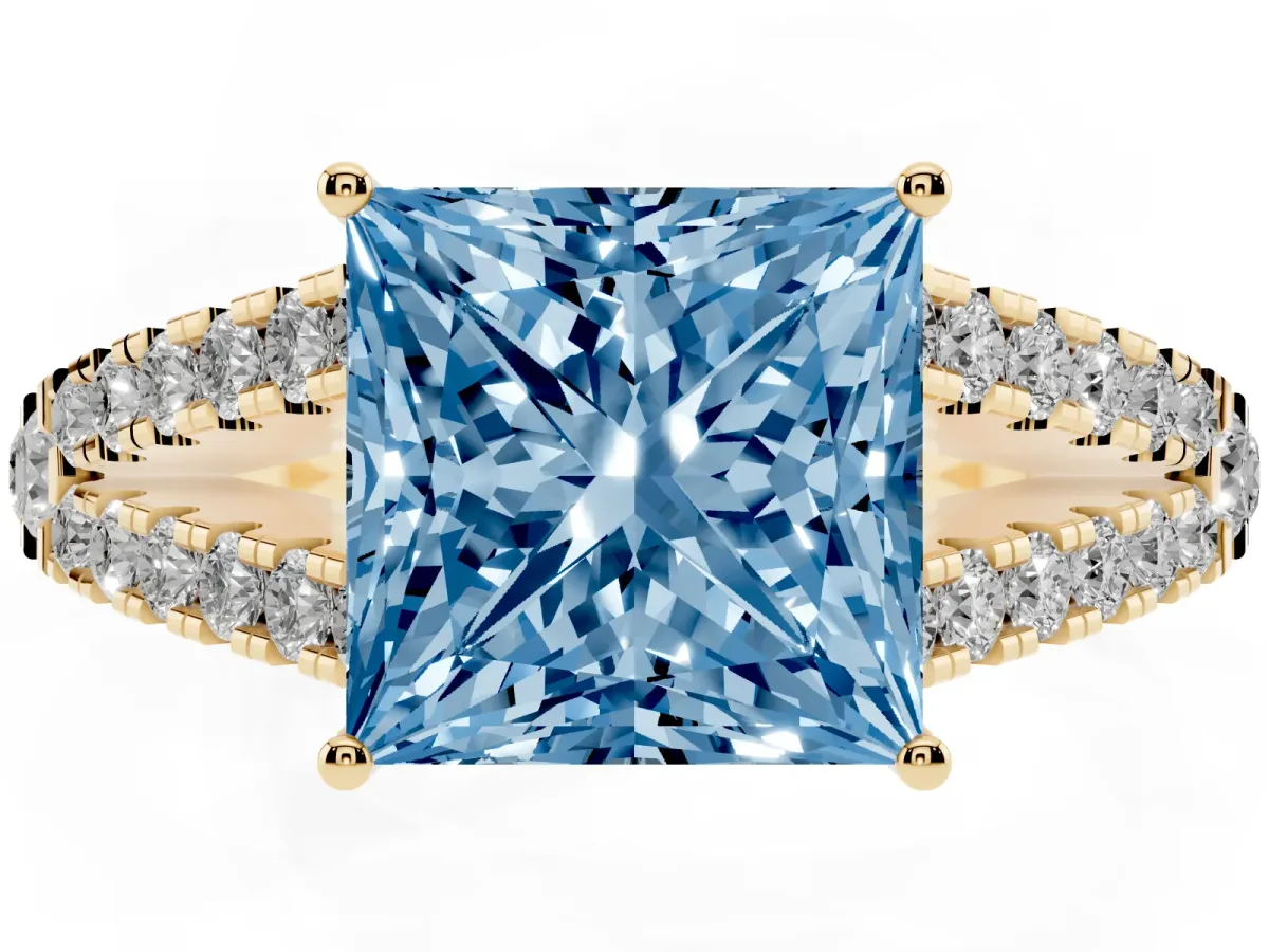 Fancy Blue Princess Cut Diamond Split Shank Pavé Engagement Ring with Four-Prong Setting Yellow gold