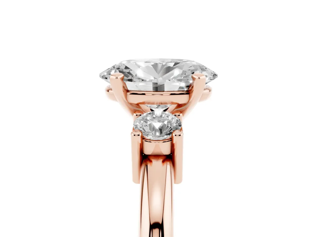 Three-Stone Oval Cut Cut Diamond Solitaire with Prong Setting and Classic Band Rose gold