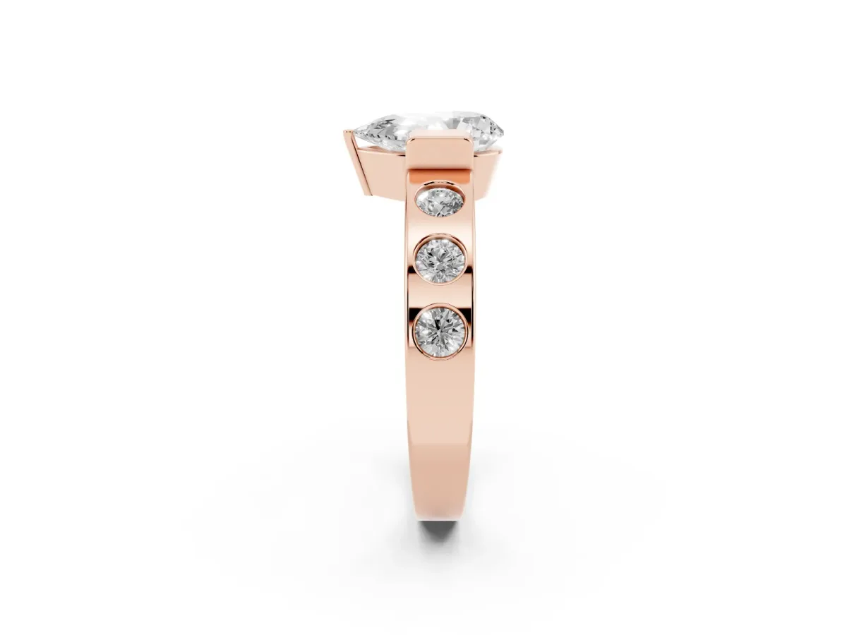 Pear Cut Brilliant Channel-Set Diamond Ring with Bezel Prong Setting Rose gold