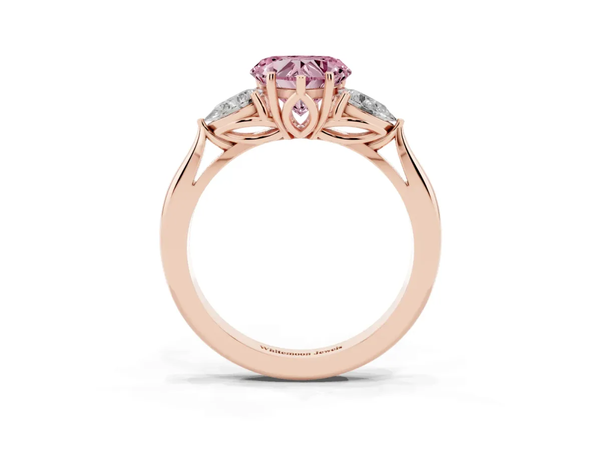 Fancy Pink Three-Stone Heart Cut Brilliant Diamond Solitaire Ring with Tapered Band and Four-Prong Setting Rose gold