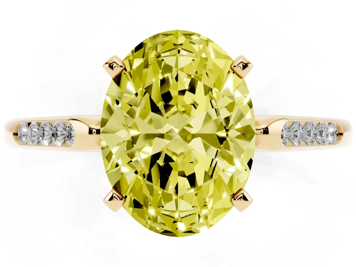 Fancy Yellow Oval Cut Diamond Solitaire Ring with Channel Set Round Band and Prong Setting Yellow gold