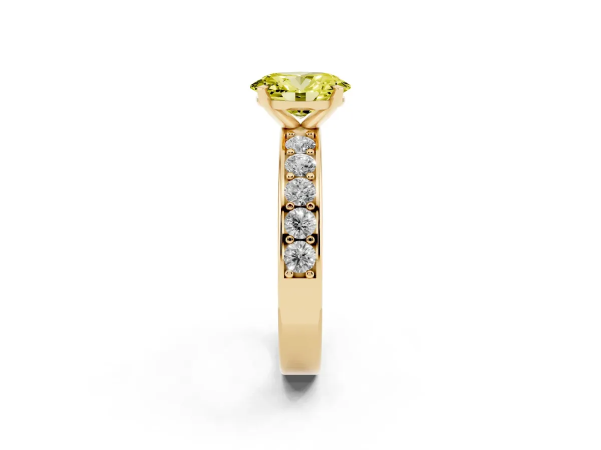 Fancy Yellow Oval Cut Diamond Engagement Ring with Channel Set Round Band and Prong Setting Yellow gold