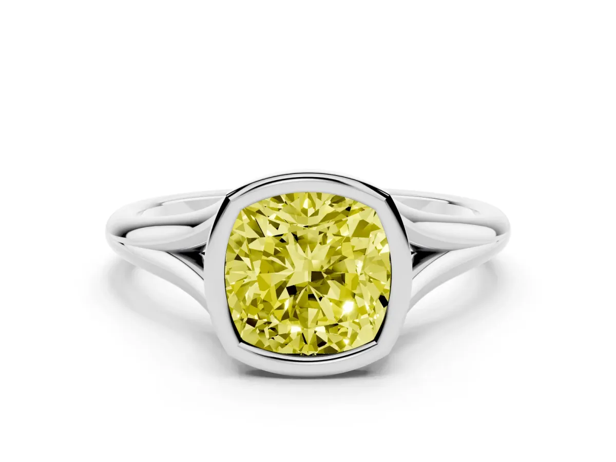 Fancy Yellow Bezel Set Cushion Cut Cut Solitaire Ring with Tapered Band White gold