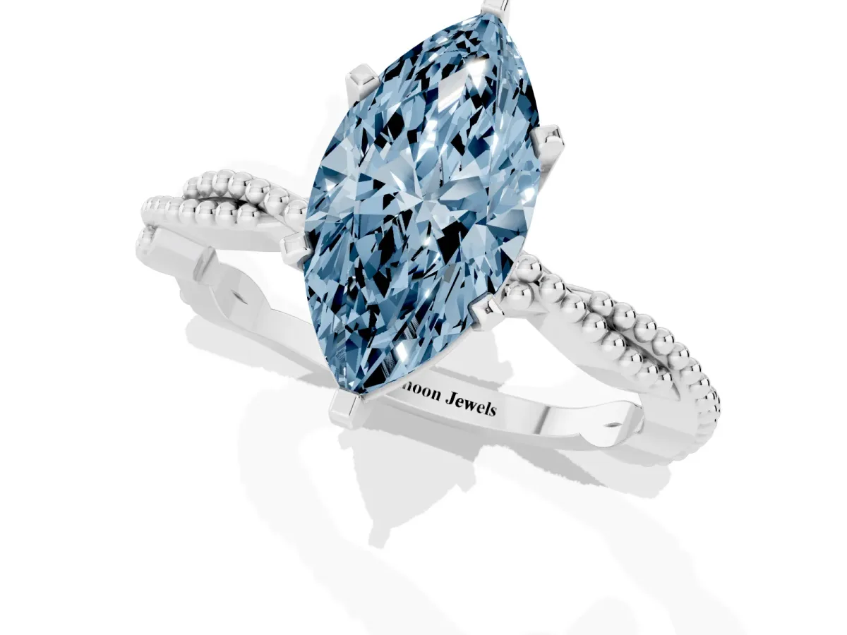 Fancy Blue Marquise Cut Solitaire Twisted Band with Bead Prong Setting Silver