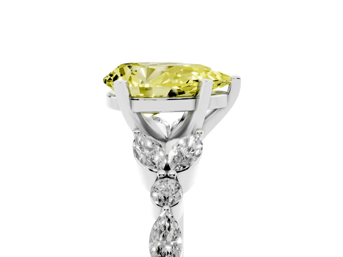 Fancy Yellow Pear Cut Diamond Solitaire Ring with Side Stones and Four-Prong Setting Platinum